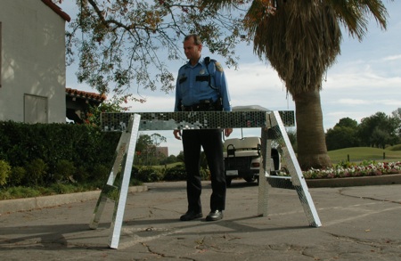 Yumi Janairo Roth, in situ Houston: Officer Jay, temporary site installation of Disco Barriers, Houston TX, 2005