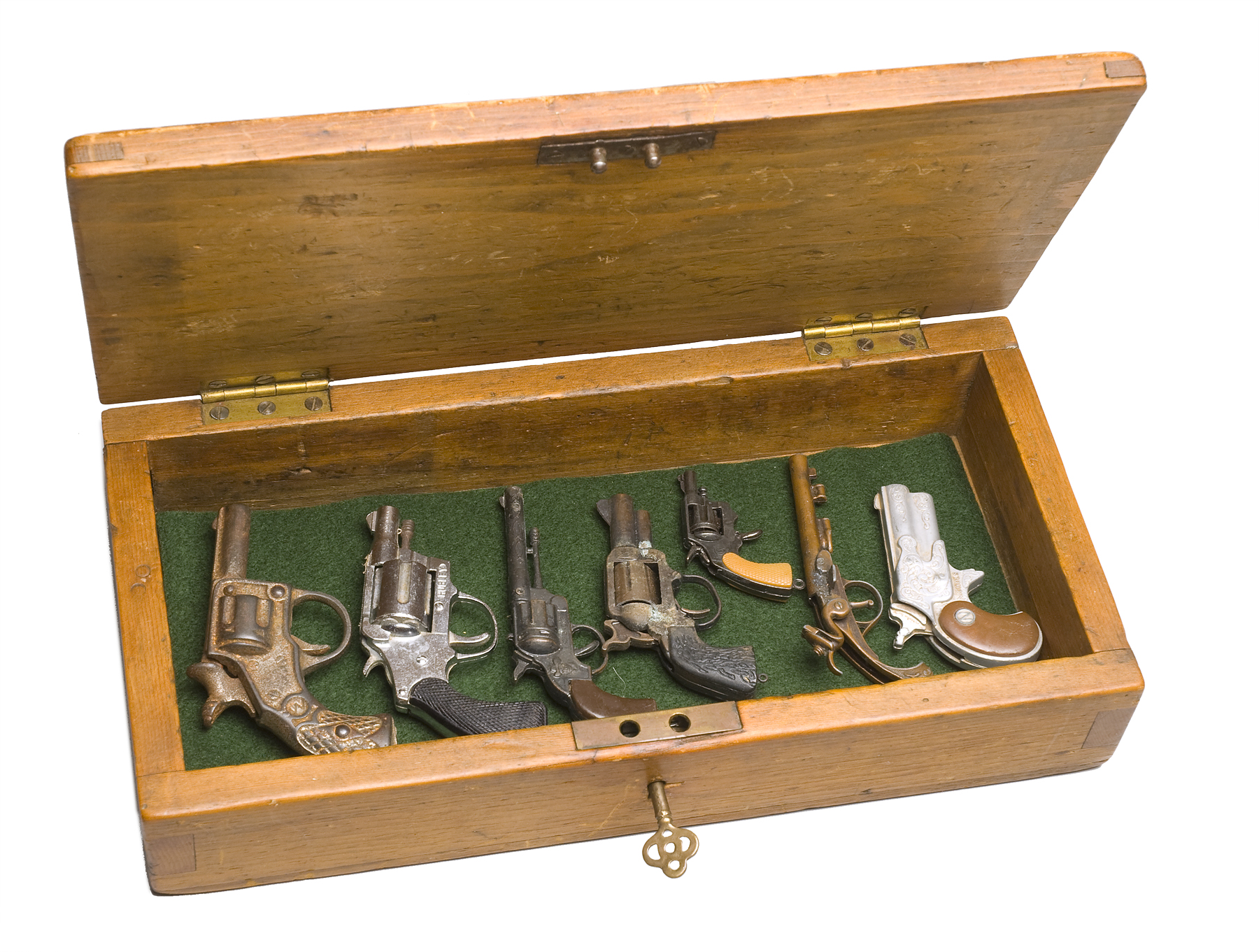 Marilyn Lanfear- Collection of Guns in a Box